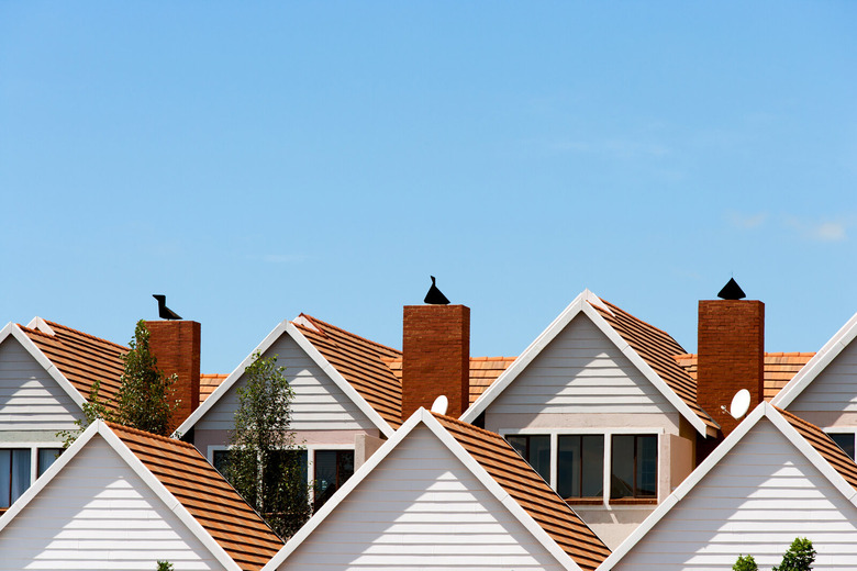 row of houses with roofs shown