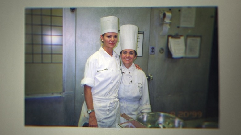 two women in white chef's outfits