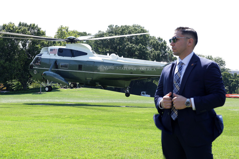 A Secret Service agent guards Marine One