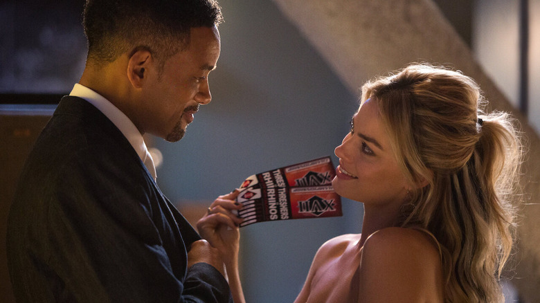 Will Smith and Margot Robbie in Focus.