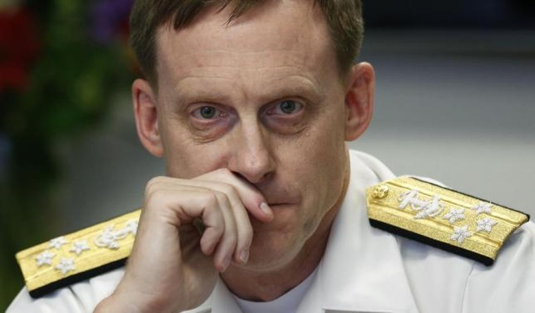 NSA Director Adm. Michael Rogers listens at Reuters CyberSecurity Summit in Washington