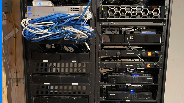 Server racks with routers and switches connecting DNS