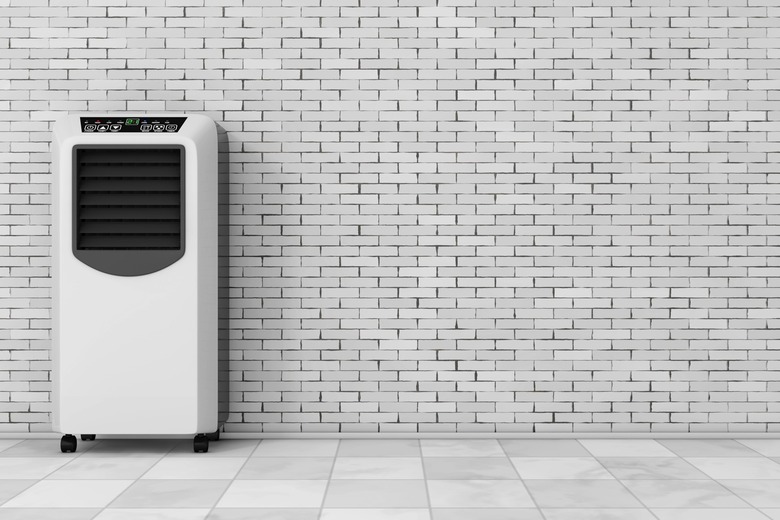 Portable air conditioner next to a wall