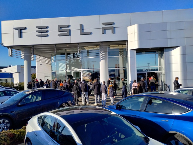 People in line to see the Cybertruck at a Tesla dealership