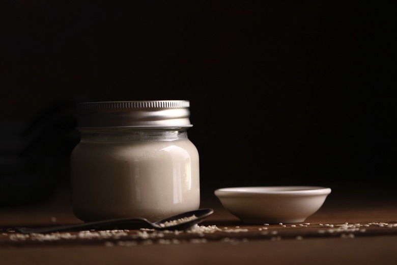 Creamy tahini sauce in a jar