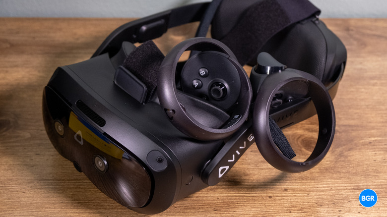 HTC Vive Focus Vision on a table with its controllers.