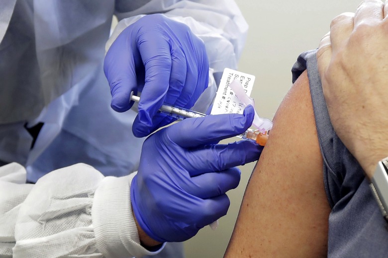 Doctor vaccinating patient