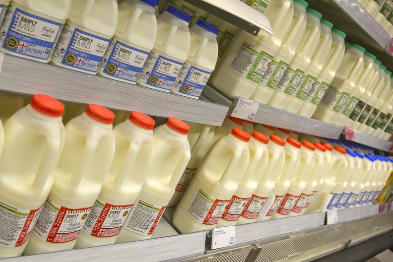 Milk on shelves in Waitrose, London, Britain - 10 Aug 2015