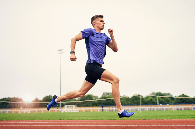 runner-running-shoes-on-track-sneakers