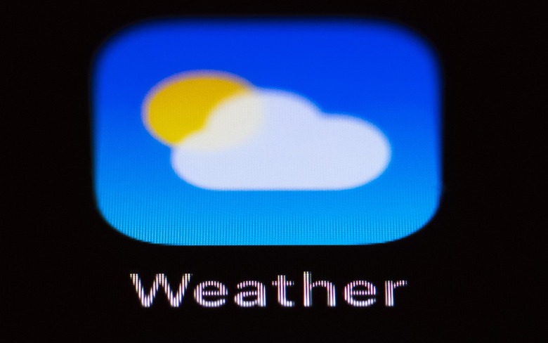 Apple's weather app can be seen on a smartphone display.