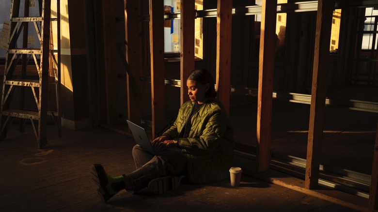 A person using the M4 MacBook Pro.