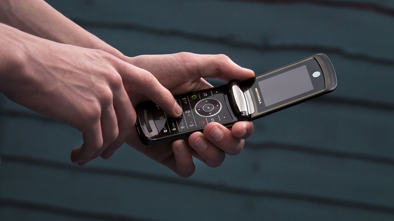 Person using a Motorola Razr Mobile Phone - Jun 2014.
