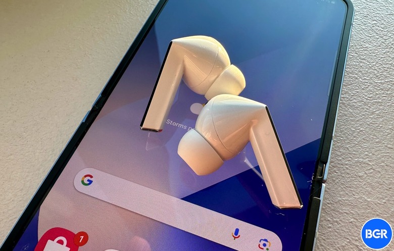 Galaxu Buds 3 Pro earbuds on top of Galaxy Z Flip 6.