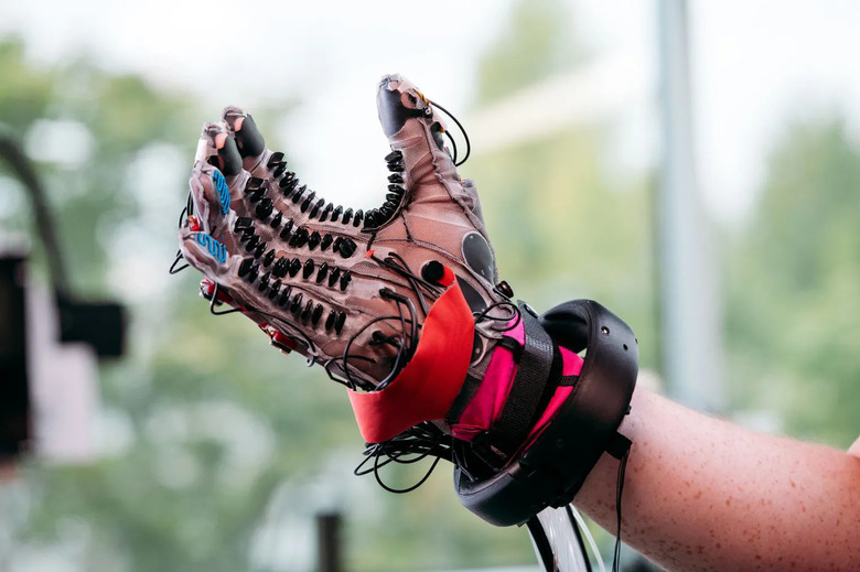 Facebook haptic glove on hand